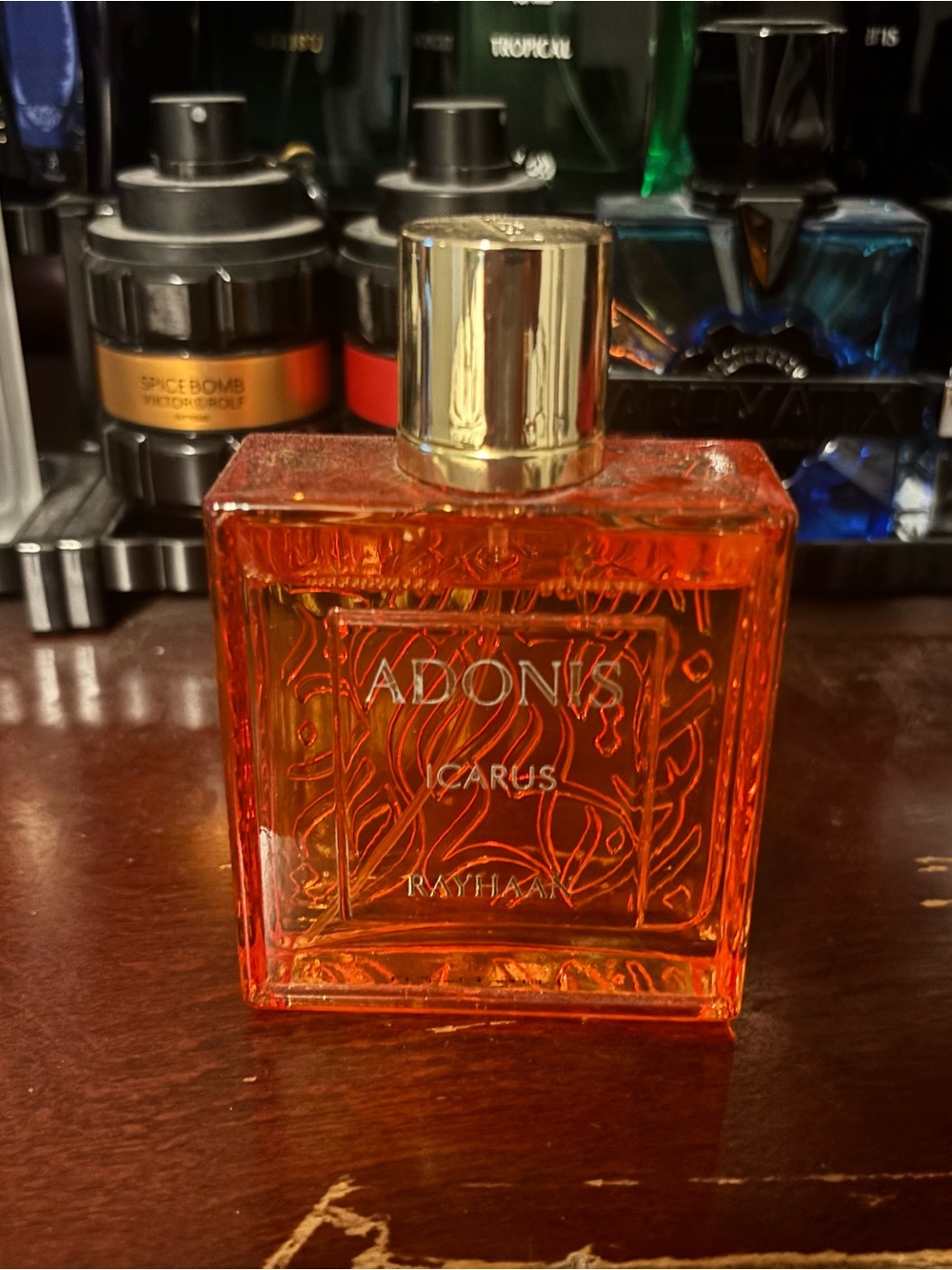 Adonis Icarus Orange Glass Home Accent Bottle